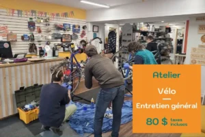 Des membres pendant un atelier vélo à l'Outillerie